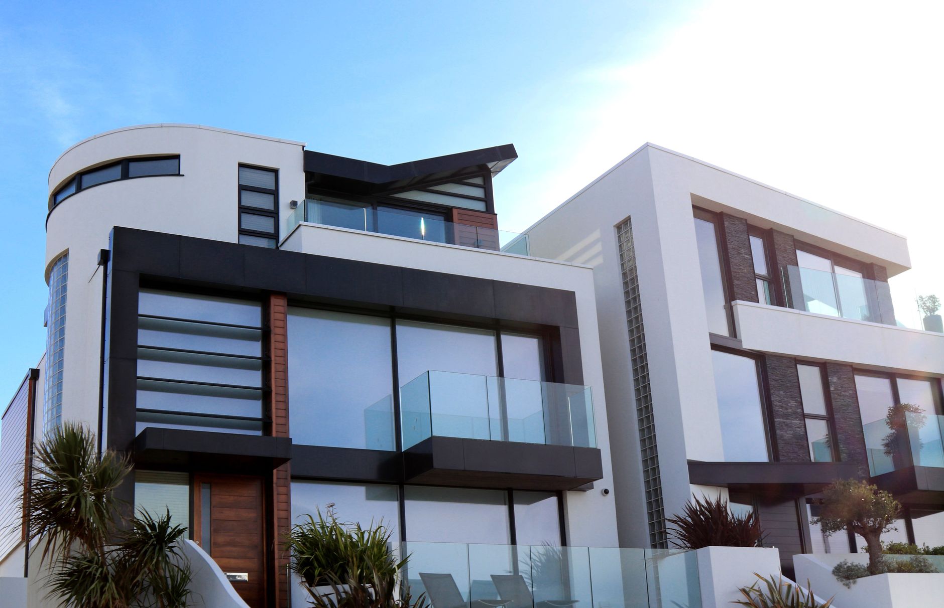 Investors reviewing blueprints of a real estate project